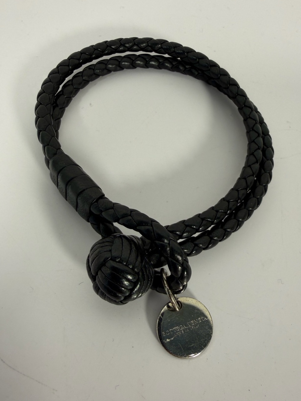 9100: Bottega Veneta Intrecciato Black Leather Knot Bracelet